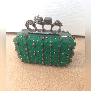 Green "For the Love of Skulls" small clutch bag.